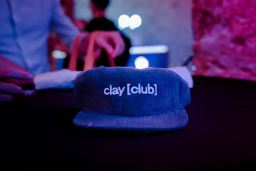 Clay Club cap on a casino table