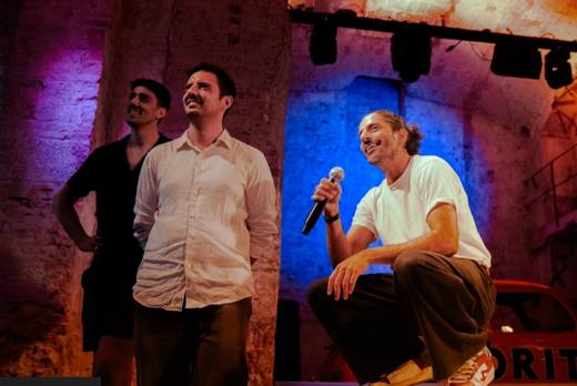 Hosts on stage at Fàbrica Moritz